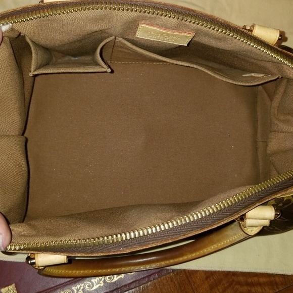 Authentic LOUIS VUITTON Tivoli purse. - Picture 3 of 8